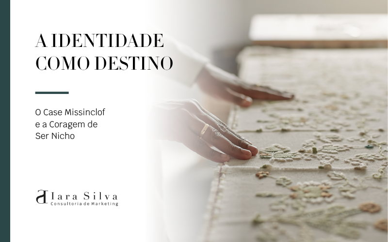 Mãos femininas tocando e ajustando um tecido bordado com detalhes florais, em um ambiente iluminado por luz natural, com foco na textura e no trabalho artesanal.